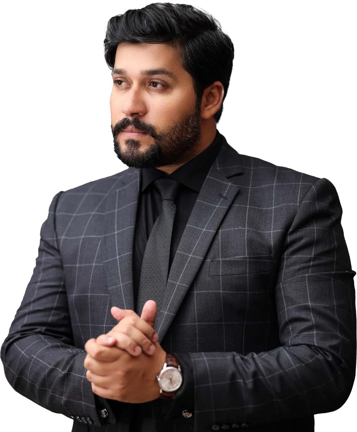 Hassaan Fareed in a dark checked blazer