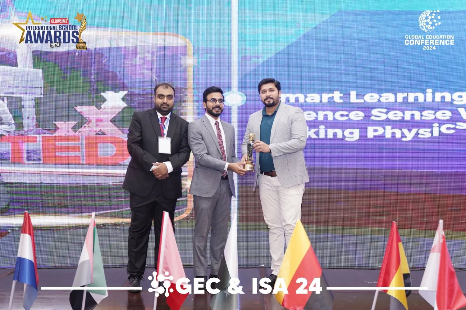Hassaan Fareed receiving the International Educator Award